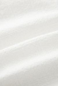 Petite Studio's Anne Linen Shorts in White
