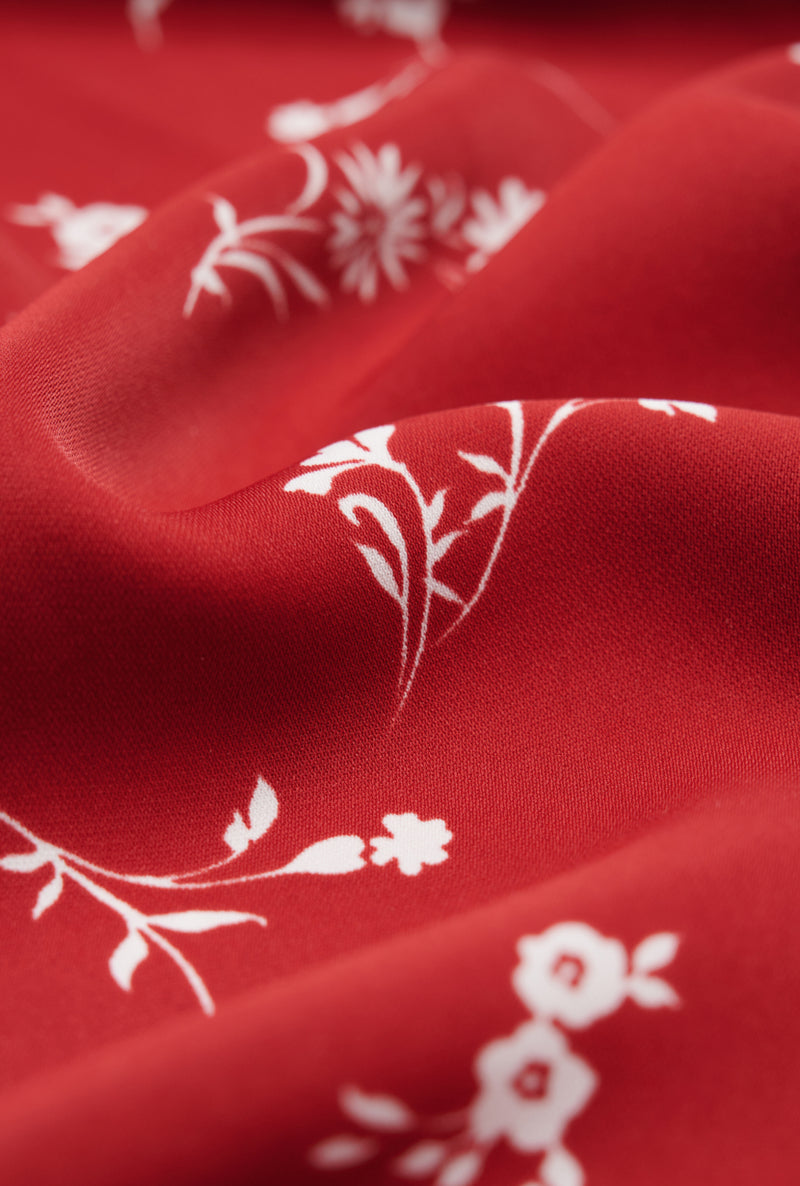 Petite Studio's Summer Lorraine Dress fabric in red floral